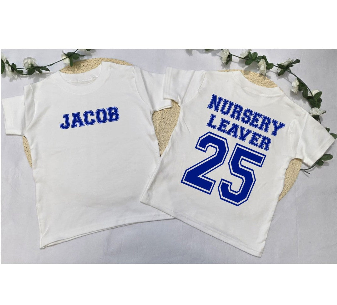 white t-shirt front and back with blue text at the back saying "nursery leaver 25" and the front has a name (personalised)
