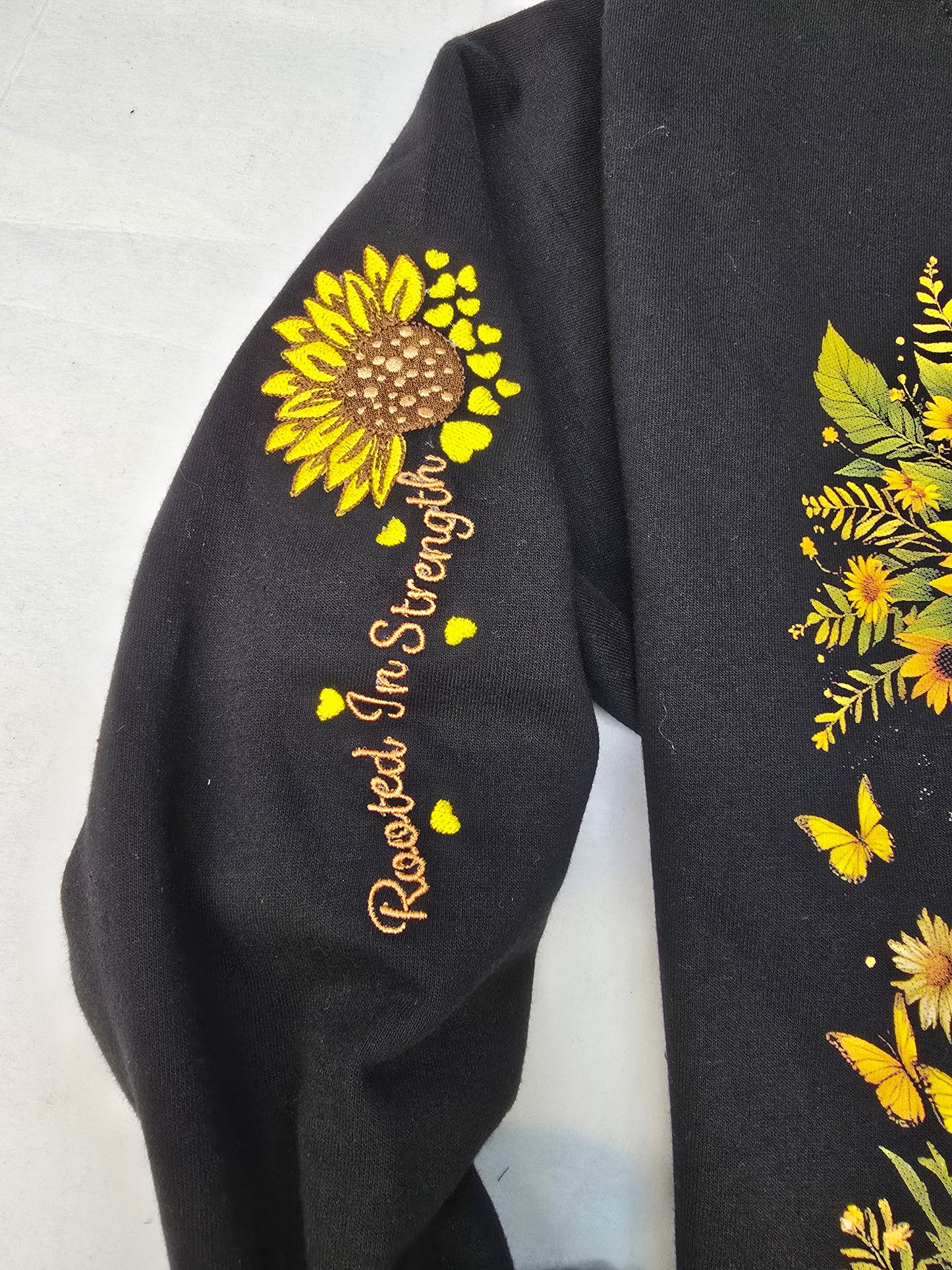 Rooted in strength sweater